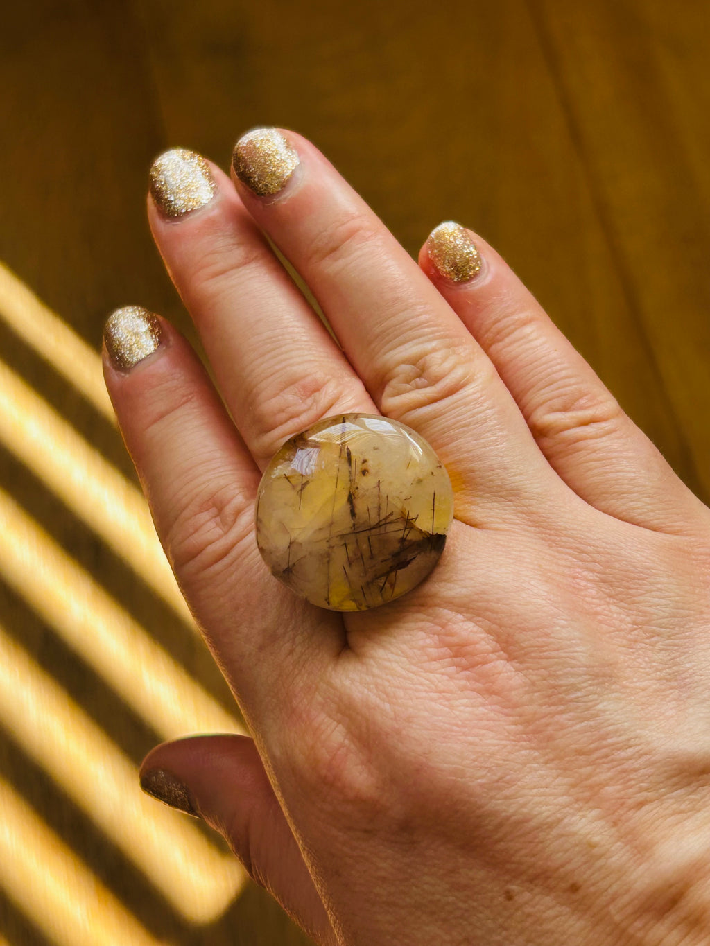 Copper Rutile Quartz Ring on Gold Plate