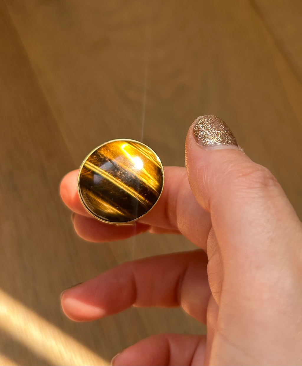 Large Tiger’s Eye on Gold Plate