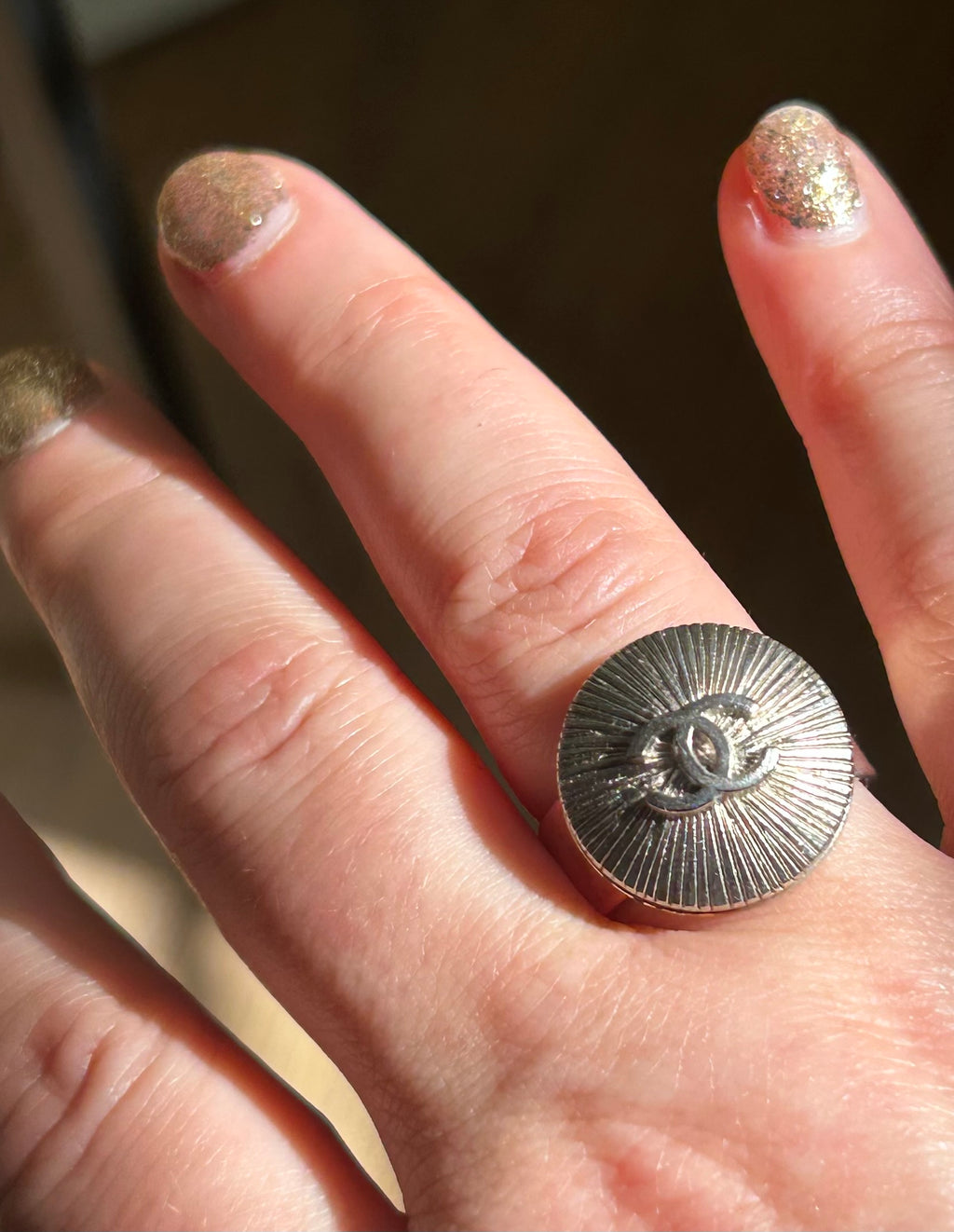 Silver Sunburst Chanel Button Ring on Silver Plate