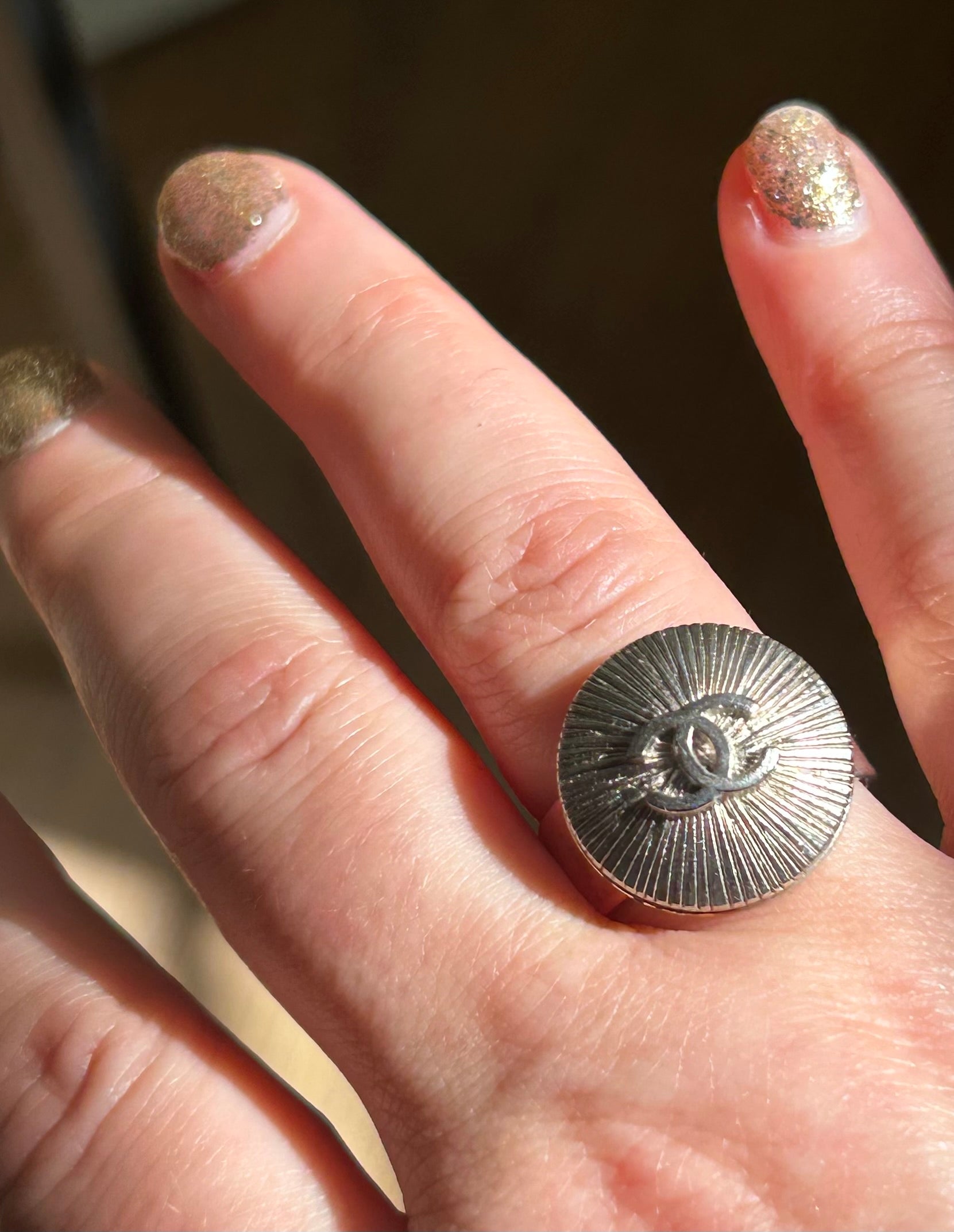 Silver Sunburst Chanel Button Ring on Silver Plate