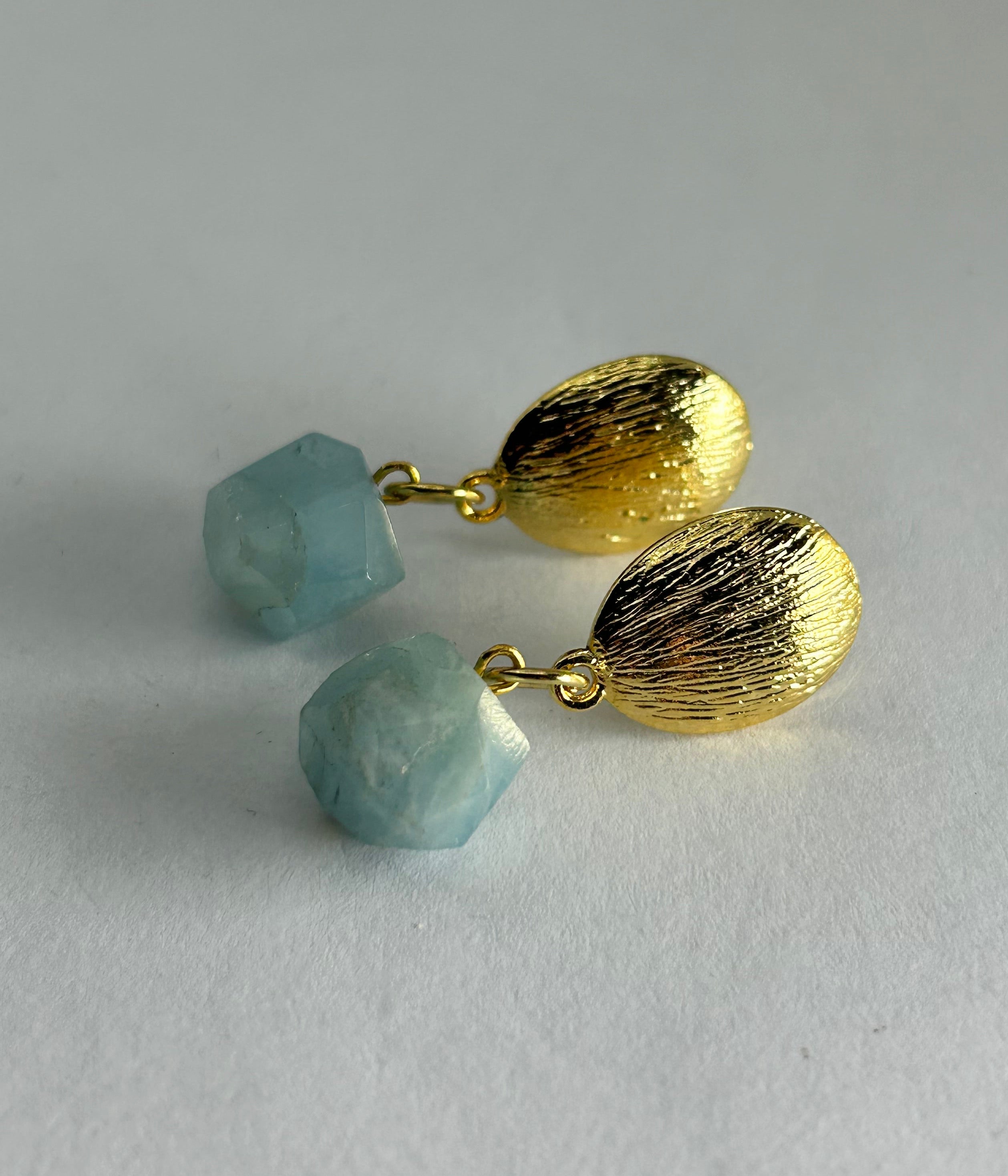 Aquamarine on Gold Plate