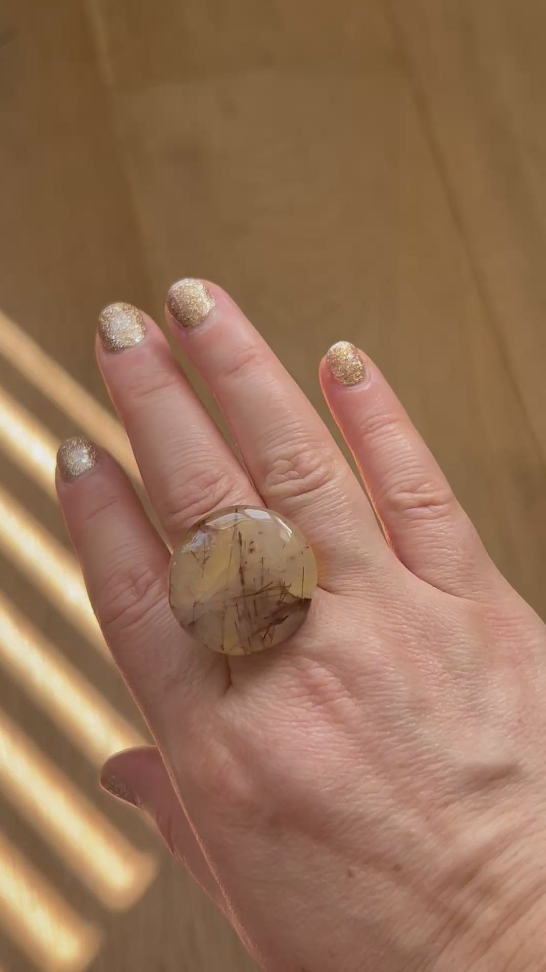 Copper Rutile Quartz Ring on Gold Plate